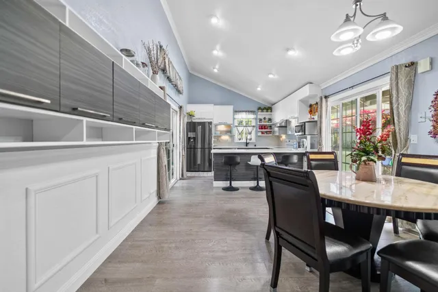 a view of a dining room with furniture