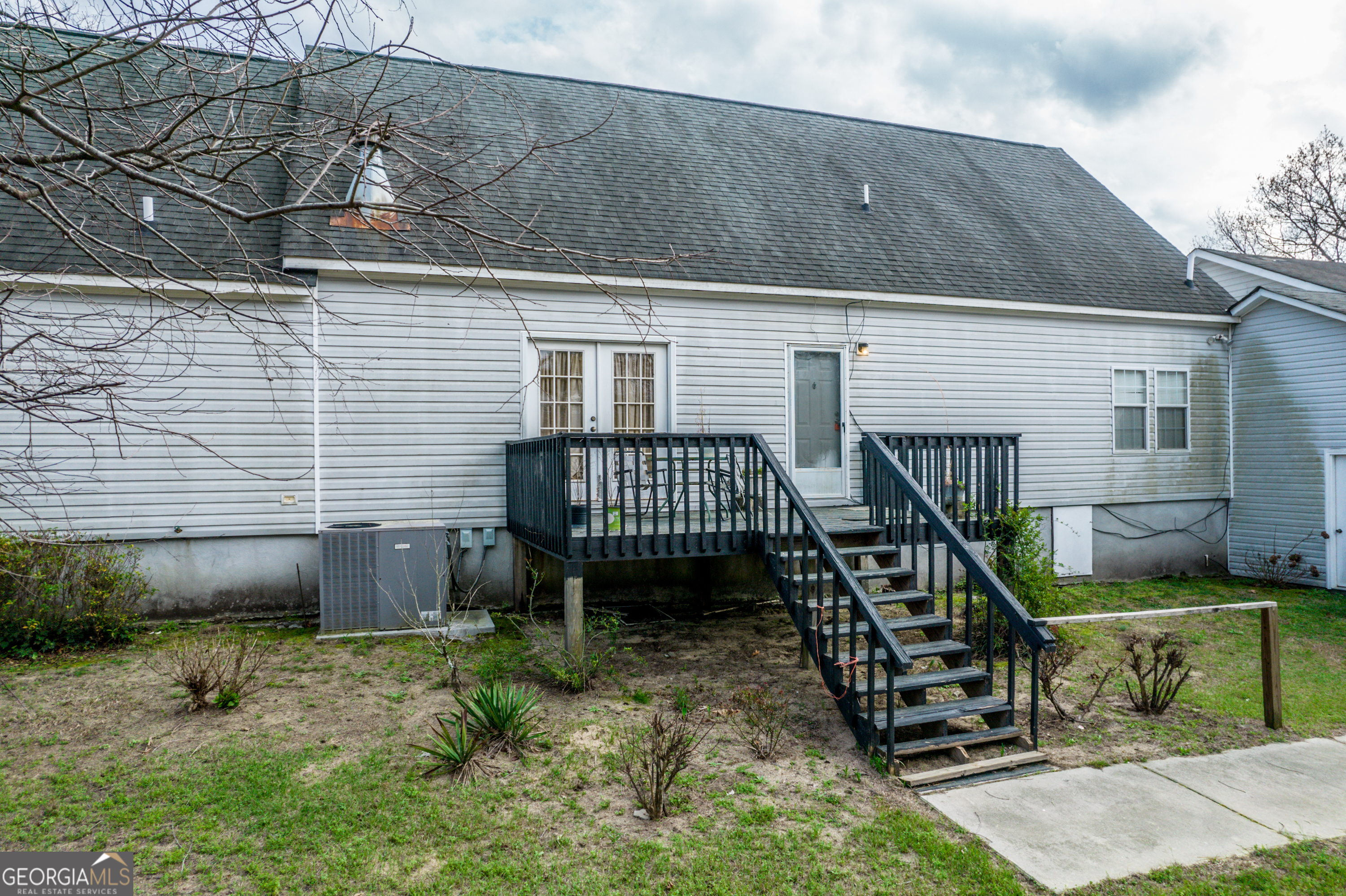 621 Highway 22 Sparta, GA 31087 - Photo 16 of 42 a view of a house with a yard