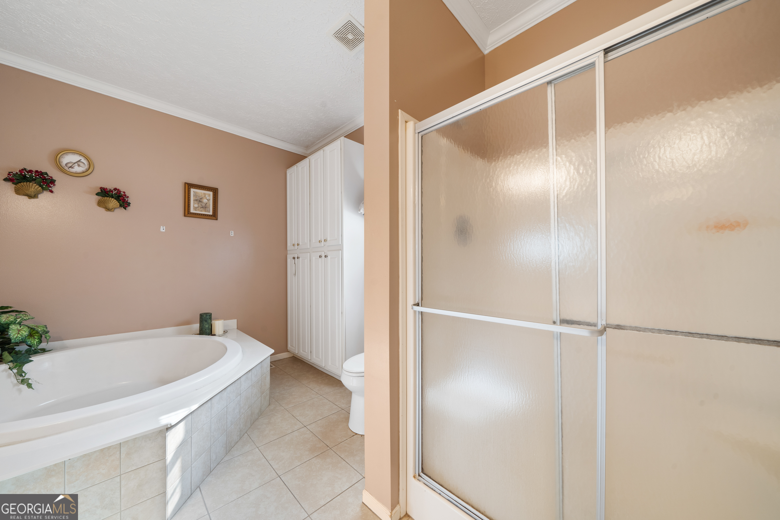 621 Highway 22 Sparta, GA 31087 - Photo 24 of 42 a bathroom with a bathtub and shower