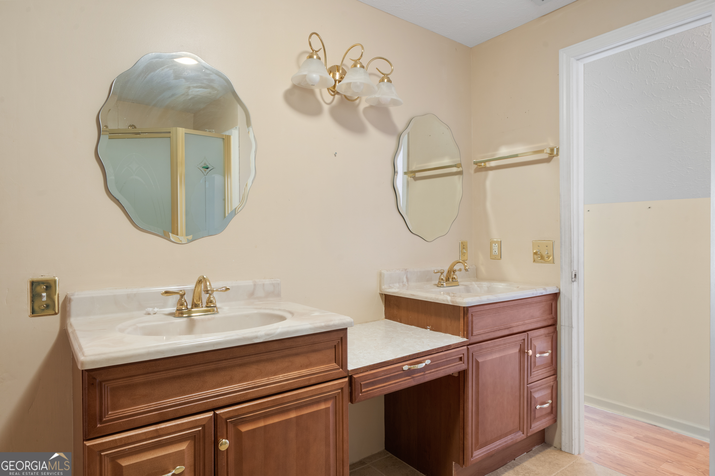 621 Highway 22 Sparta, GA 31087 - Photo 35 of 42 a bathroom with a sink a mirror and a mirror