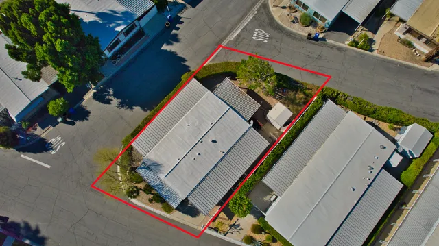 a view of a livingroom with an empty space and a window