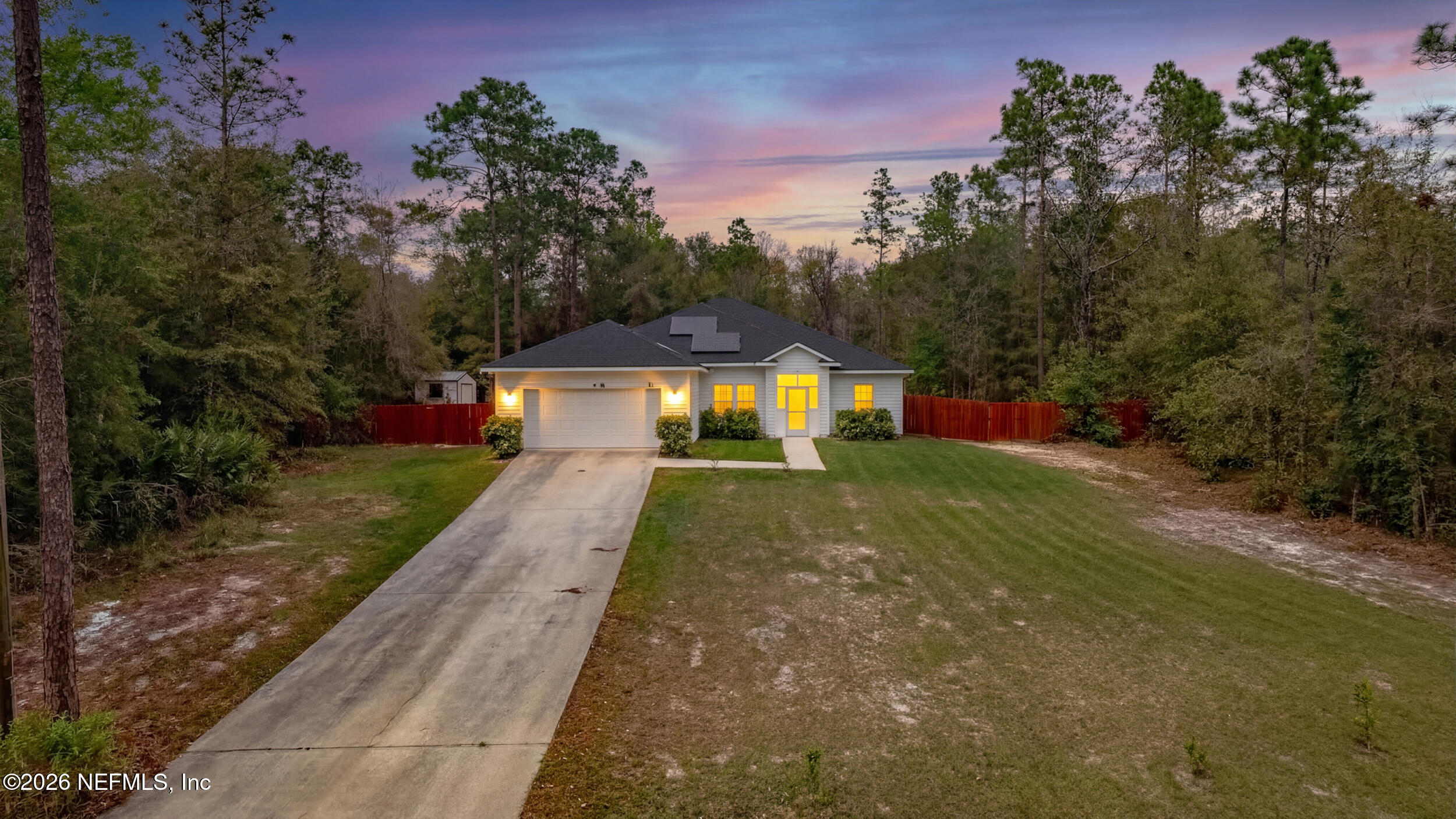 94 Sorrel Street Middleburg, FL 32068 - Photo 2 of 40 a front view of a house with a yard