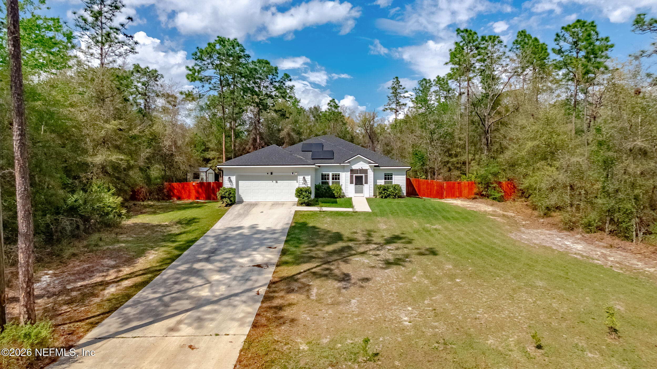 94 Sorrel Street Middleburg, FL 32068 - Photo 31 of 40 a front view of a house with a yard