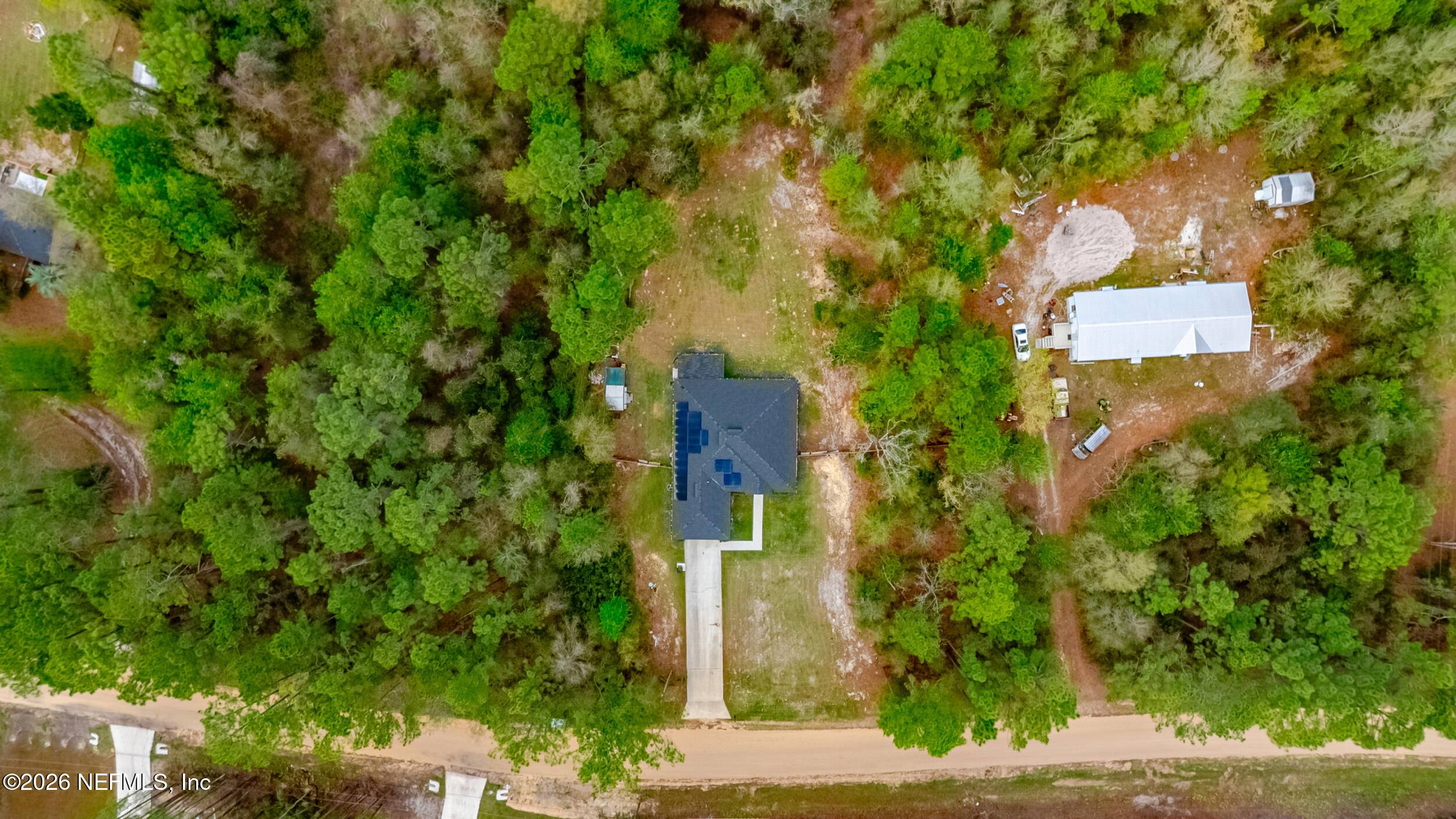 94 Sorrel Street Middleburg, FL 32068 - Photo 36 of 40 an aerial view of a house with a yard and tree s