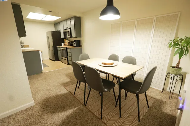 a view of a dining room with furniture