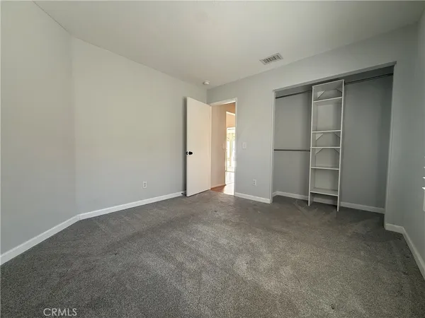 an empty room with closet