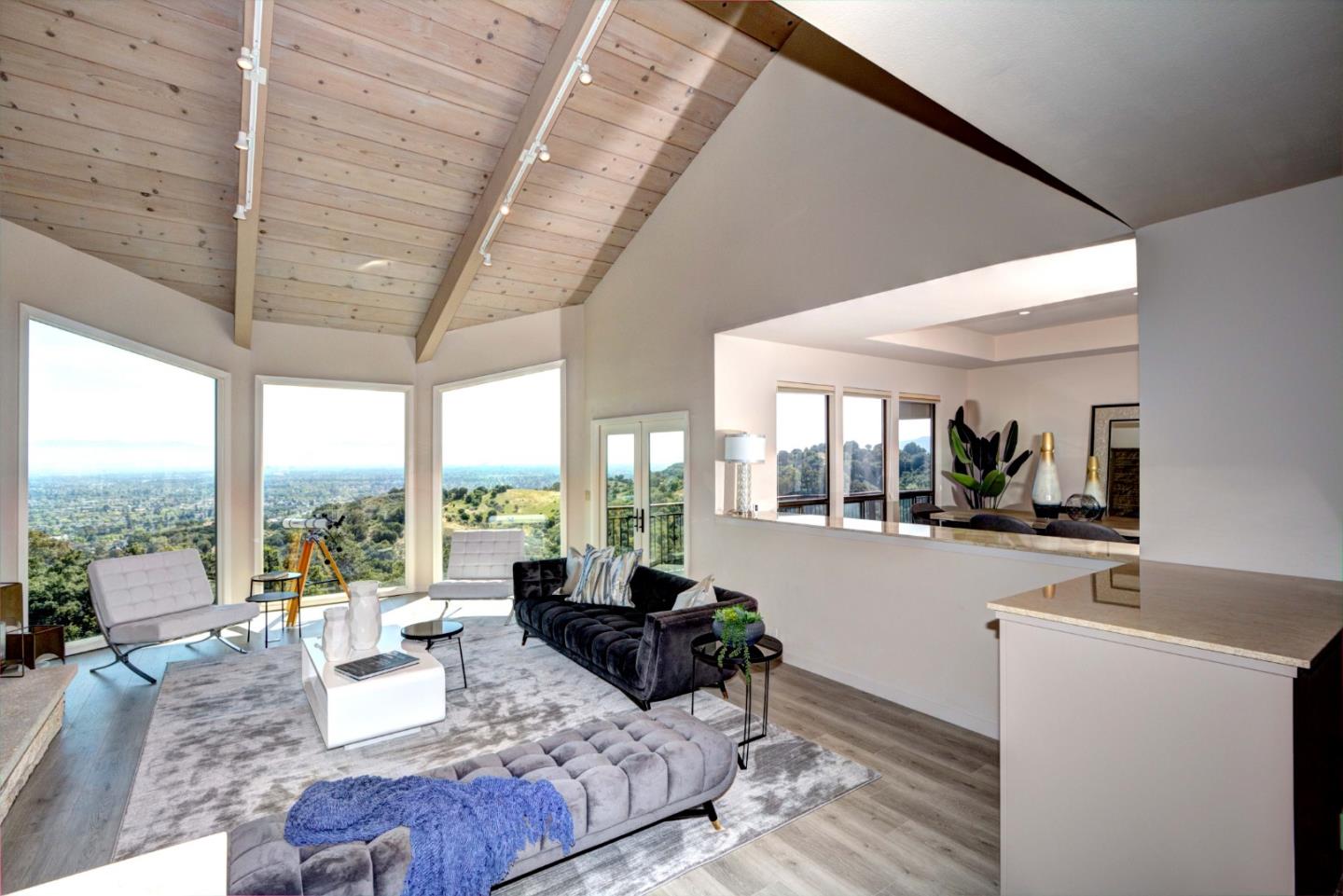 22365 Regnart Road Cupertino, CA 95014 - Photo 15 of 54 a living room with furniture large window and wooden floor