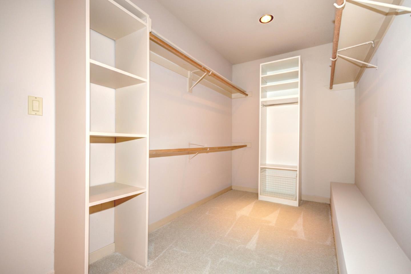 22365 Regnart Road Cupertino, CA 95014 - Photo 29 of 54 a view of an empty room with cabinet and floors