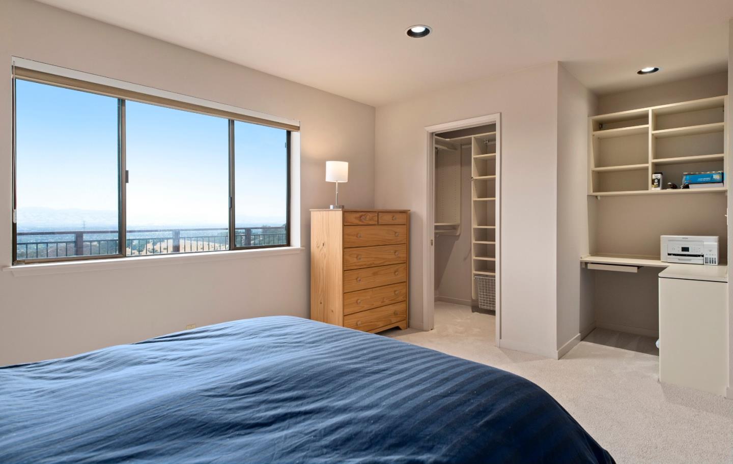 22365 Regnart Road Cupertino, CA 95014 - Photo 38 of 54 a bedroom with a bed and a dresser