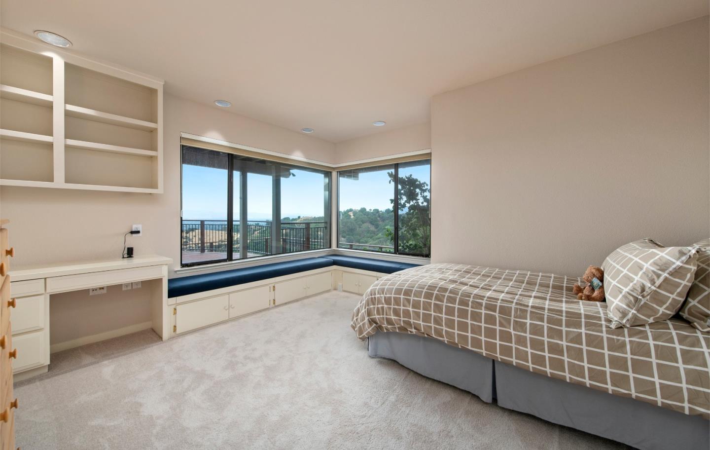 22365 Regnart Road Cupertino, CA 95014 - Photo 40 of 54 a bedroom with a bed and a window