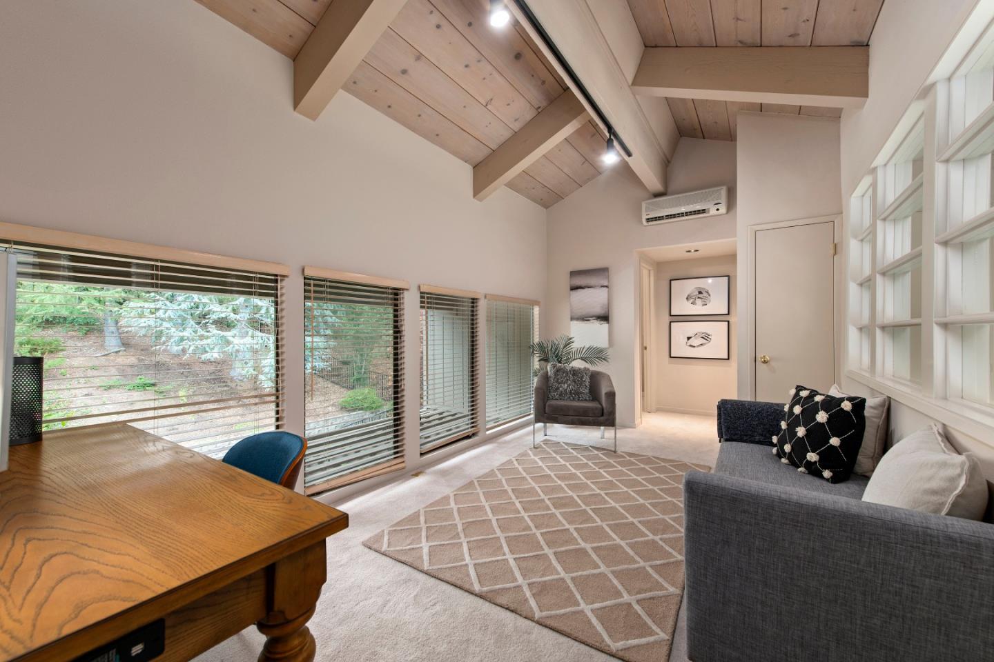 22365 Regnart Road Cupertino, CA 95014 - Photo 45 of 54 a living room with furniture and a large window