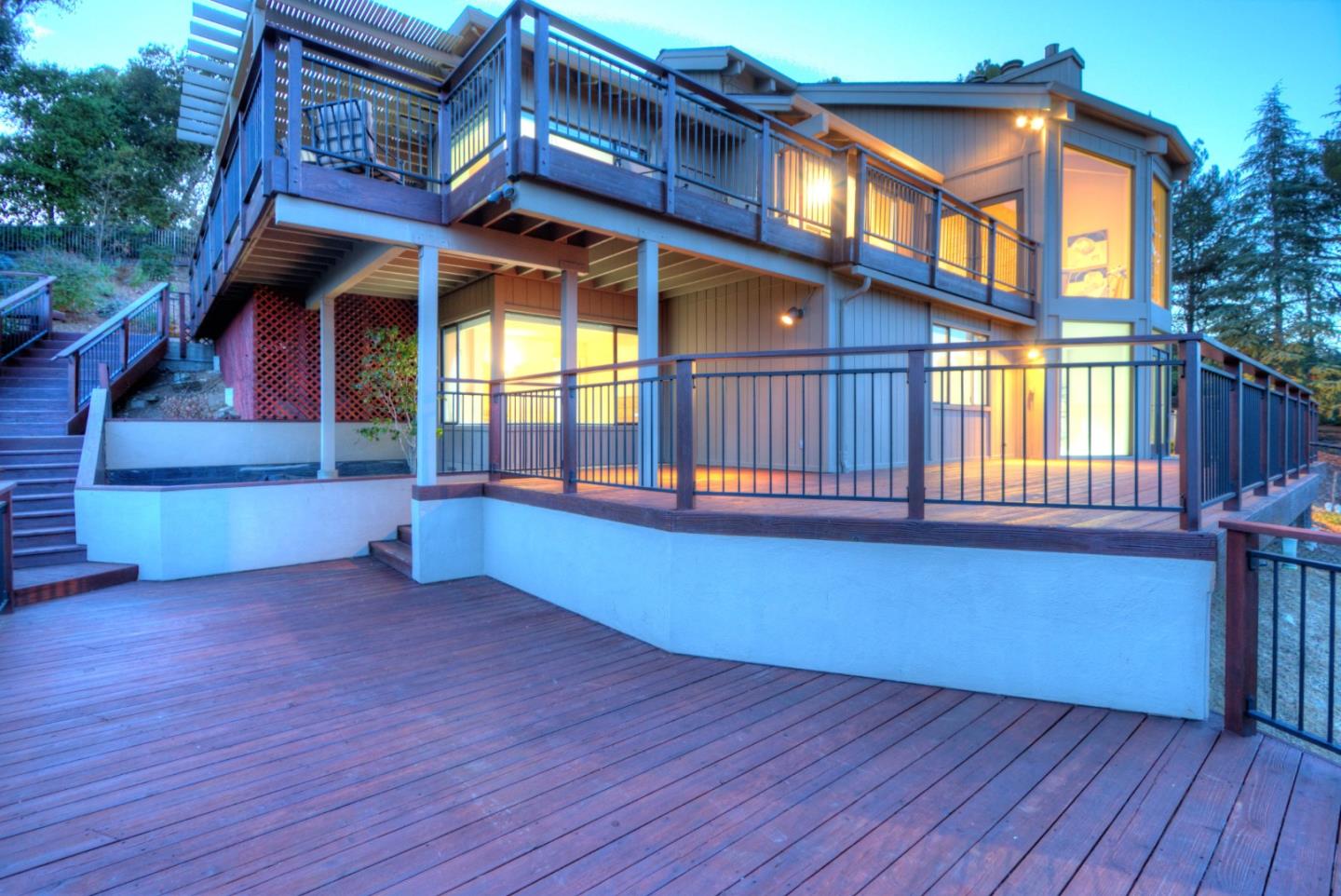 22365 Regnart Road Cupertino, CA 95014 - Photo 51 of 54 a view of a house with a deck