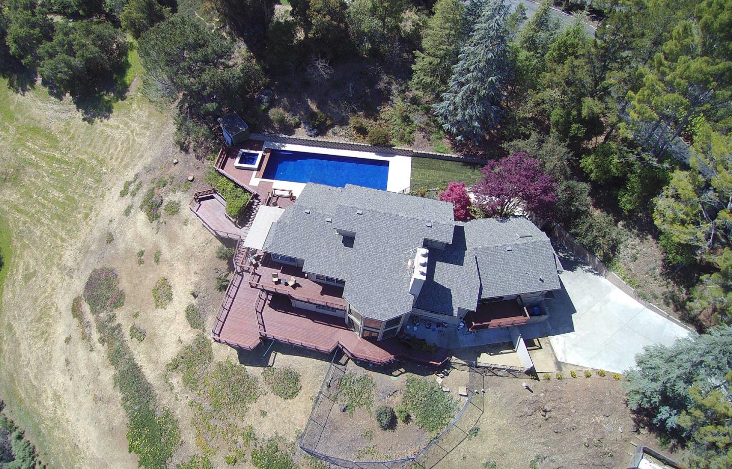 22365 Regnart Road Cupertino, CA 95014 - Photo 52 of 54 an aerial view of a house with a yard