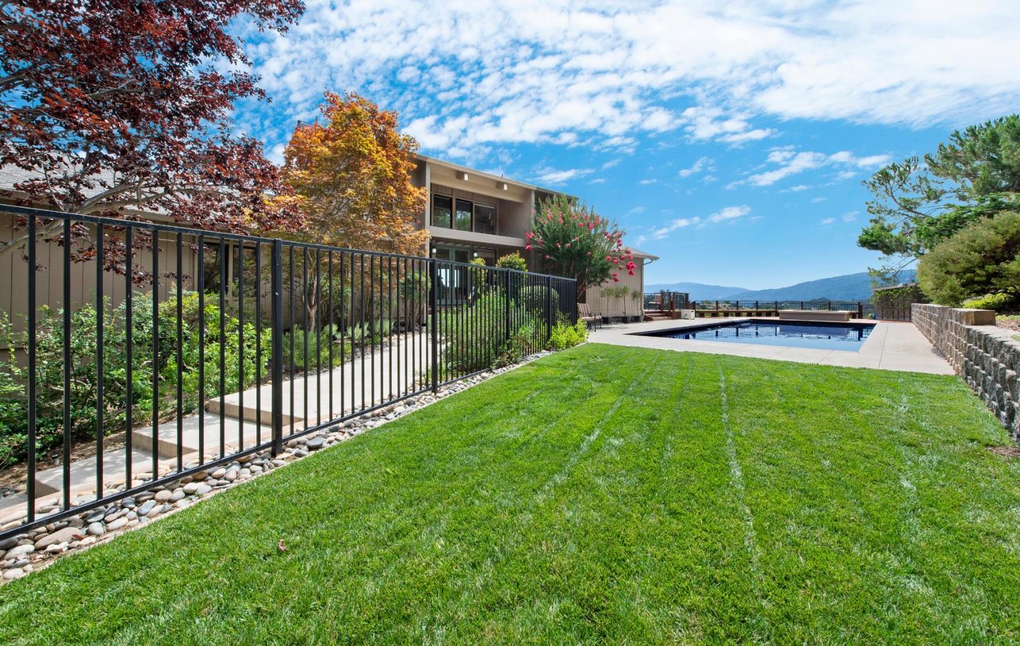 22365 Regnart Road Cupertino, CA 95014 - Photo 7 of 54 a view of a yard and front view of a house