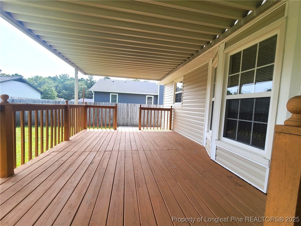 6521 Applewhite Road Fayetteville, NC 28304 - Photo 20 of 22 a view of backyard with a deck