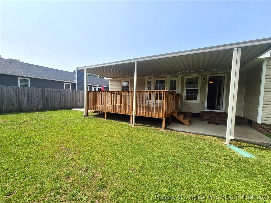 6521 Applewhite Road Fayetteville, NC 28304 - Photo 22 of 22 front view of a house with a yard