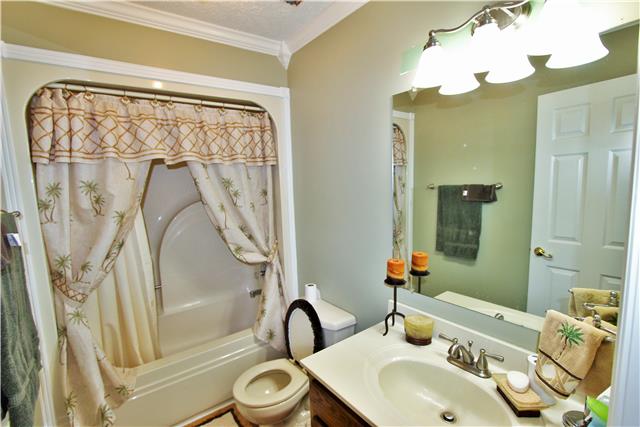1051 Academy Road Lebanon, TN 37087 - Photo 8 of 20 a bathroom with a sink and a mirror