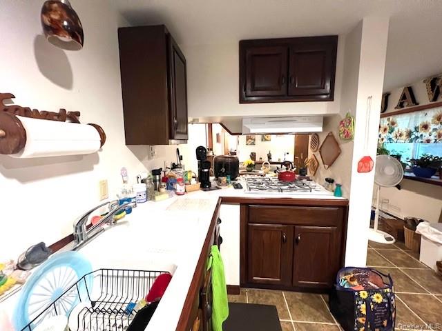 250 County Road 21 Barryville, NY 12719 - Photo 13 of 18 a kitchen with a sink and a stove top oven