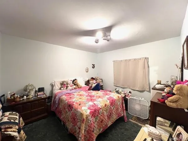 a bed room with a bed and a couch