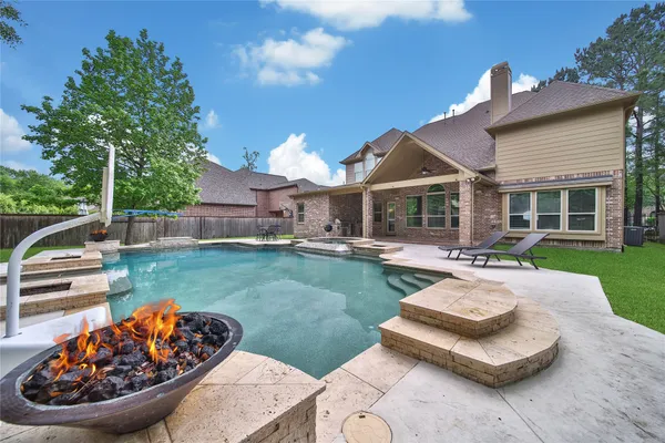 $995,000 | 106 Spanish Bay Place, Montgomery, TX 77316