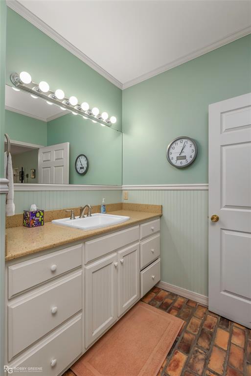 3100 Herren Road Doyline, LA 71023 - Photo 26 of 40 a bathroom with a sink a vanity and a mirror