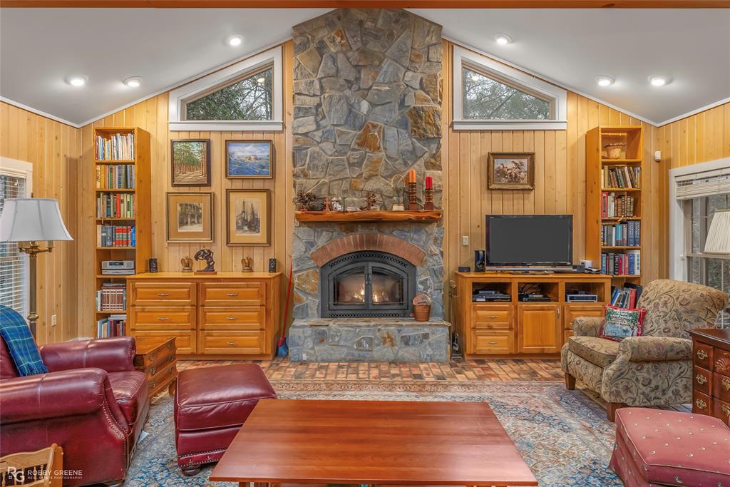 3100 Herren Road Doyline, LA 71023 - Photo 9 of 40 a living room with furniture a rug and a fireplace