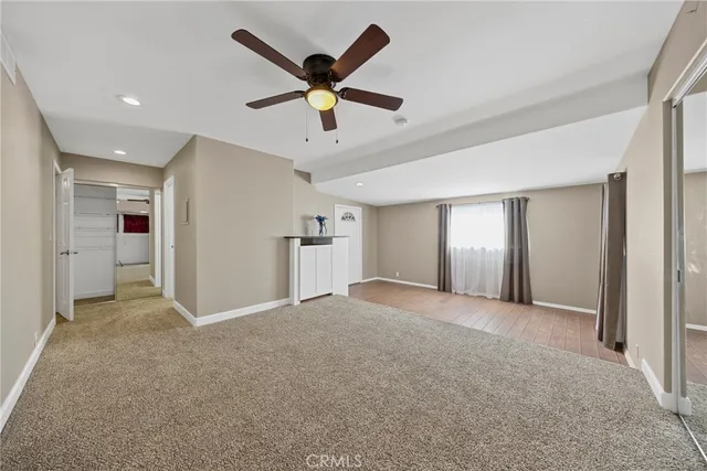 a view of a livingroom with a ceiling fan