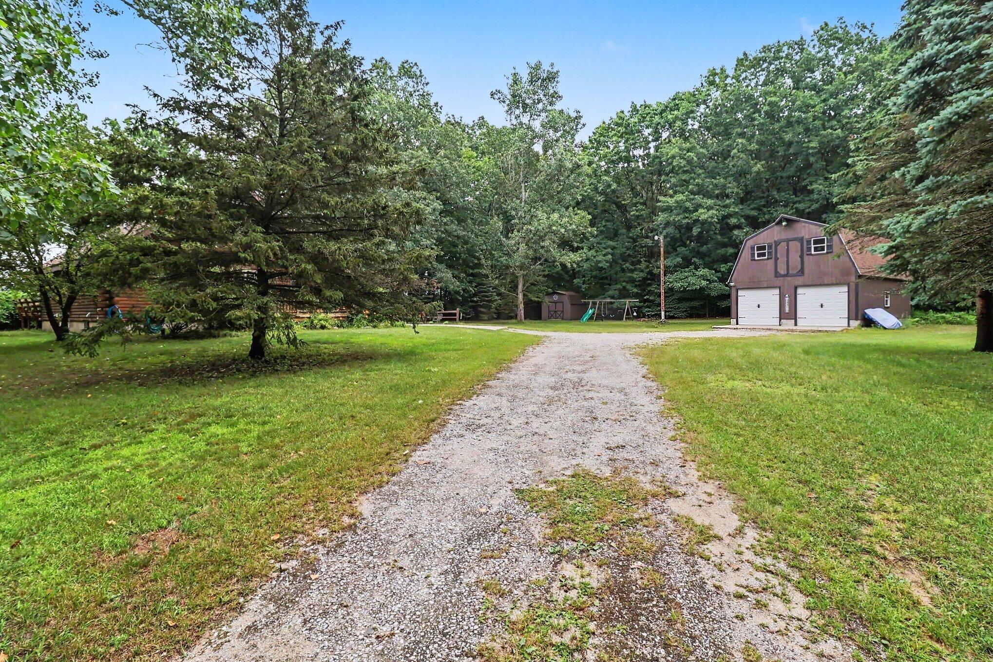 1384 Olson Road Manistee, MI 49660 - Photo 29 of 35 Yard / Driveway