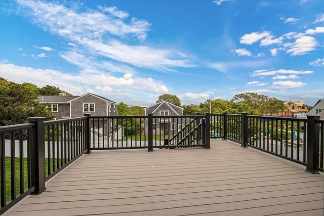 a view of a balcony with city view