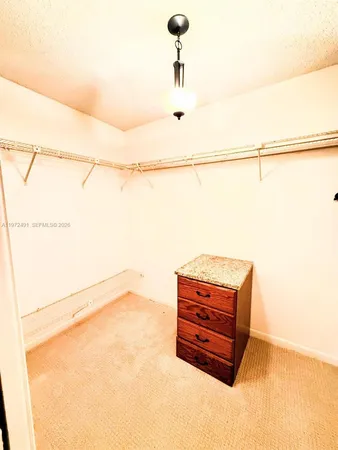 a view of a room with racks on the wall