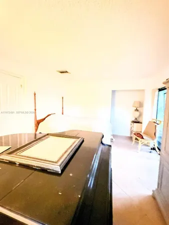 a view of a living room with a couch