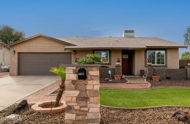 a front view of a house with patio