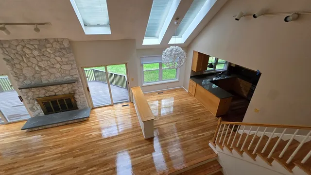 a view of bedroom with window and hardwood floor