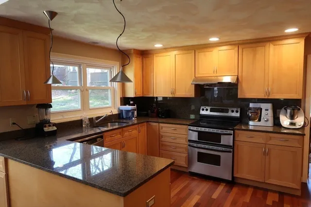 a bathroom with a sink toilet and mirror
