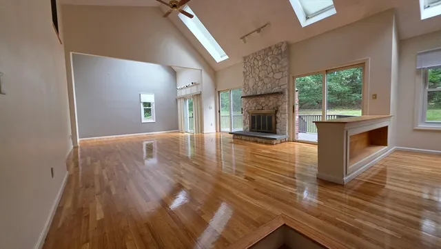 a view of an empty room with windows