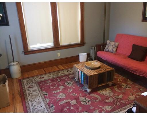 114 Belchertown Street Three Rivers, MA 01080 - Photo 11 of 27 a living room with a couch and a rug