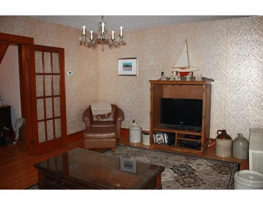 114 Belchertown Street Three Rivers, MA 01080 - Photo 14 of 27 a living room with furniture and a flat screen tv