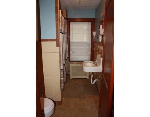 114 Belchertown Street Three Rivers, MA 01080 - Photo 18 of 27 a bathroom with a sink a toilet and shower