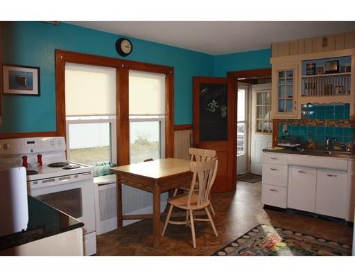 114 Belchertown Street Three Rivers, MA 01080 - Photo 5 of 27 a dining room with a table and chairs