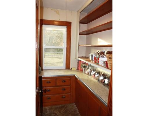 114 Belchertown Street Three Rivers, MA 01080 - Photo 7 of 27 a kitchen with a sink and cabinets