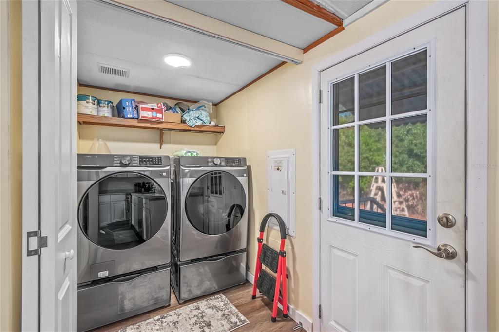6601 Southwest 84th Street Ocala, FL 34476 - Photo 22 of 36 a utility room with dryer and washer