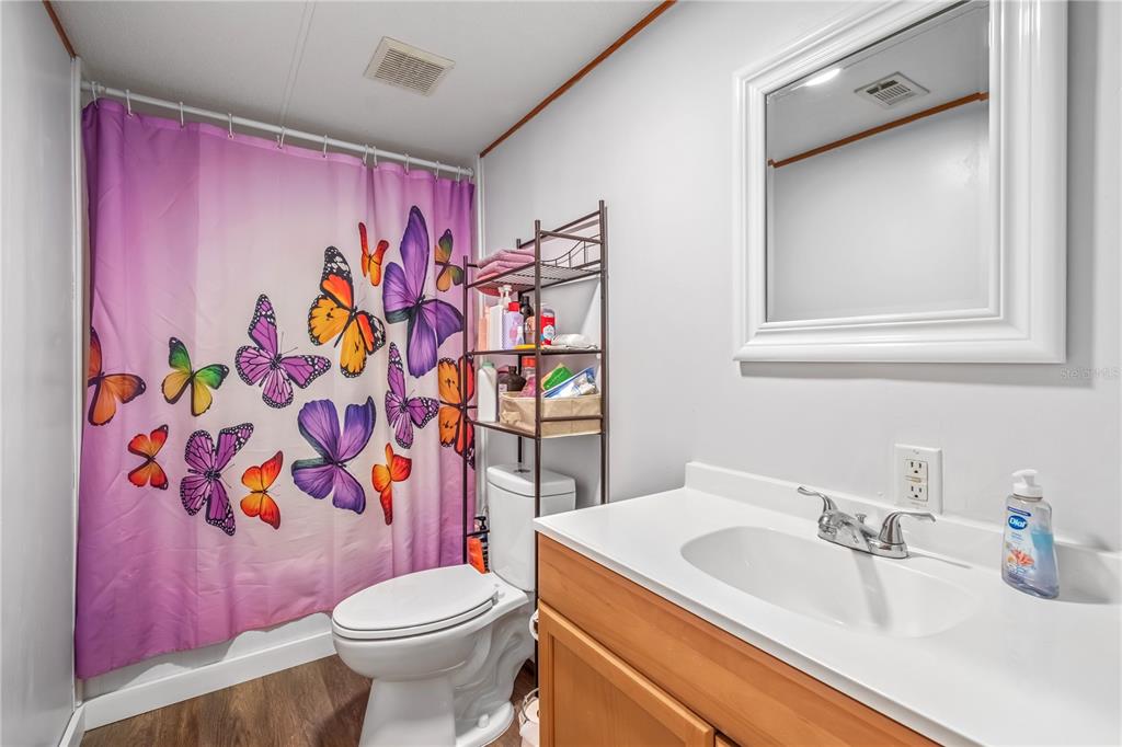 6601 Southwest 84th Street Ocala, FL 34476 - Photo 28 of 36 a bathroom with a sink and toilet