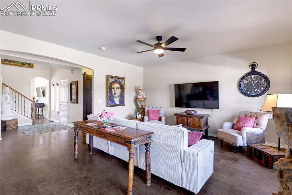 778 Gold Canyon Road Monument, CO 80132 - Photo 12 of 43 Walkout to a spacious deck from the living room