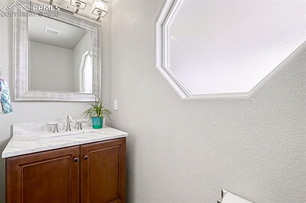 778 Gold Canyon Road Monument, CO 80132 - Photo 18 of 43 Main level 1/2 bathroom