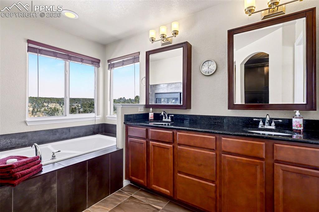 778 Gold Canyon Road Monument, CO 80132 - Photo 22 of 43 Primary bathroom has a soaking tub, separate shower and double vanity