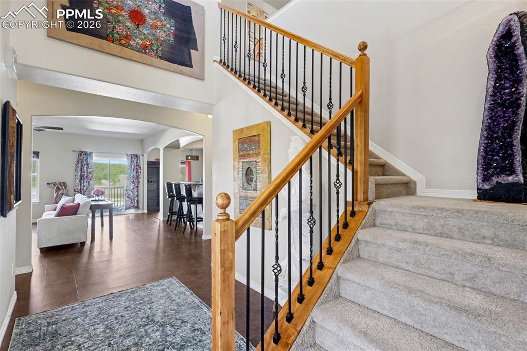778 Gold Canyon Road Monument, CO 80132 - Photo 5 of 43 Entry opens to the open-style family room/kitchen combo