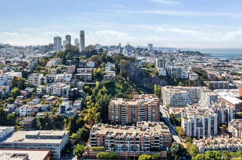 a view of a city with tall buildings