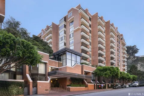 a view of a building with a street