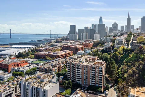 a view of a city with tall buildings