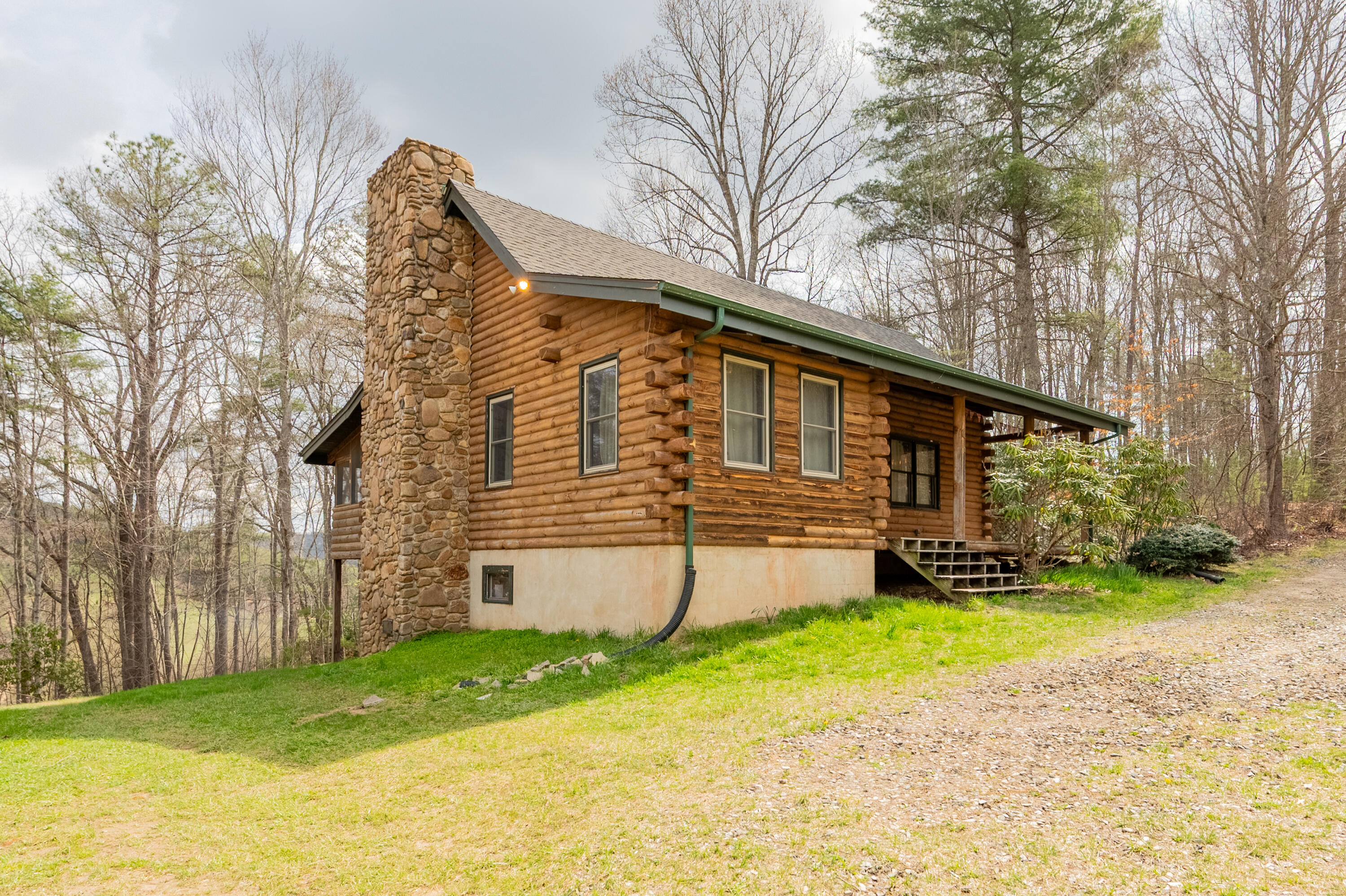 183 Pine Mountain Road Northeast Floyd, VA 24091 - Photo 4 of 54 a view of a house with a yard